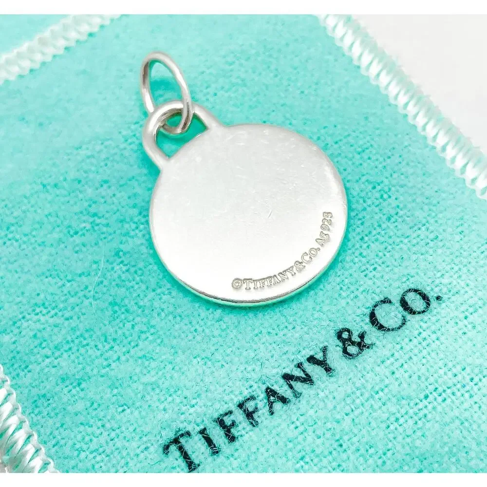 Tiffany & Co. Return to Tiffany Blue Enamel Border Round Charm Pendant Sterling
